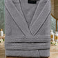 Soft white cotton Turkish towel by TORK, displaying its lightweight, absorbent fabric and traditional woven design.