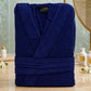 White cotton Turkish towel from TORK with intricate traditional patterns, displayed folded on a neutral background.