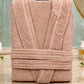 White cotton Tork Turkish bath towel with textured pattern, soft and absorbent for comfortable use.
